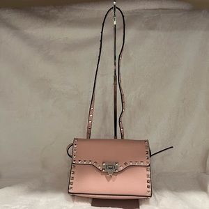 Brand new Pink leather crossbody handbag with gold metallic .